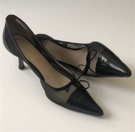 vintage chanel classic pump with front strap and button|chanel black and white pumps.